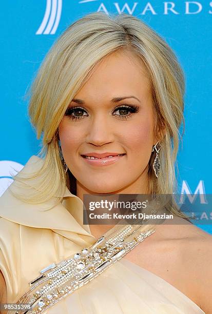 Singer Carrie Underwood arrives for the 45th Annual Academy of Country Music Awards at the MGM Grand Garden Arena on April 18, 2010 in Las Vegas,...