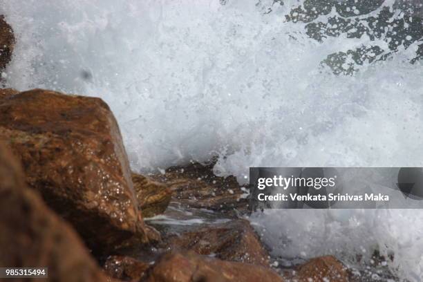 water vs wave vs rock - maka stock pictures, royalty-free photos & images