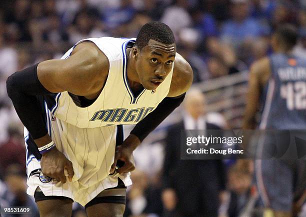 Dwight Howard of the Orlando Magic prepares to shoot free throws after being fouled against the Charlotte Bobcats in Game One of the Eastern...