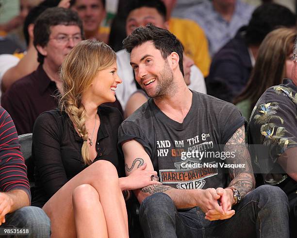 Adam Levine and his guest attend a game between the Oklahoma City Thunder and the Los Angeles Lakers at Staples Center on April 18, 2010 in Los...