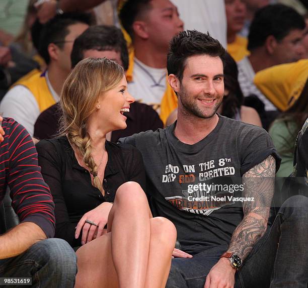 Adam Levine and his guest attend a game between the Oklahoma City Thunder and the Los Angeles Lakers at Staples Center on April 18, 2010 in Los...