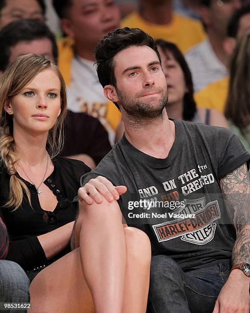 Adam Levine and his guest attend a game between the Oklahoma City Thunder and the Los Angeles Lakers at Staples Center on April 18, 2010 in Los...