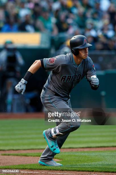 Jake Lamb of the Arizona Diamondbacks at bat against the Oakland Athletics during the second inning at the Oakland Coliseum on May 25, 2018 in...