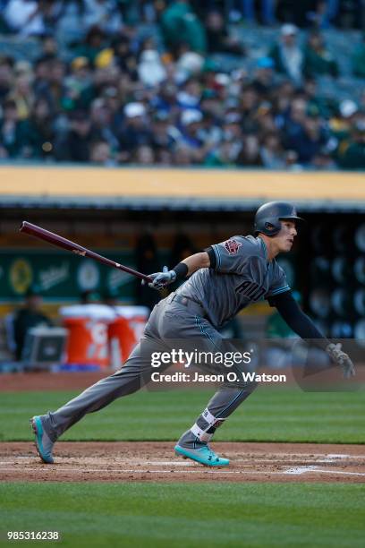 Jake Lamb of the Arizona Diamondbacks at bat against the Oakland Athletics during the second inning at the Oakland Coliseum on May 25, 2018 in...