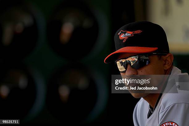 Cesar Izturis of the Baltimore Orioles looks on against the Oakland Athletics during an MLB game at the Oakland-Alameda County Coliseum on April 18,...