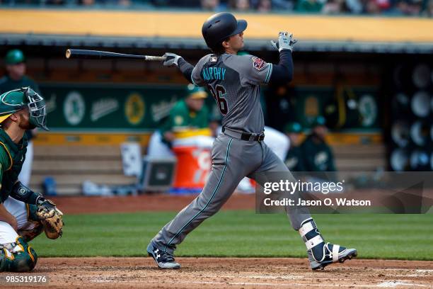 John Ryan Murphy of the Arizona Diamondbacks at bat against the Oakland Athletics during the third inning at the Oakland Coliseum on May 25, 2018 in...