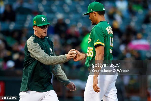 Sean Manaea of the Oakland Athletics is relieved by manager Bob Melvin during the fourth inning against the Arizona Diamondbacks at the Oakland...