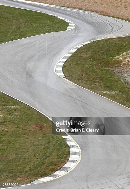 Lone motorcycle races through the esses during the AMA Superbike Showdown at Road Atlanta on April 18, 2010 in Braselton, Georgia.