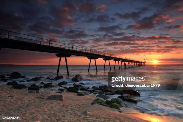 sunrise or hope - badalona stock pictures, royalty-free photos & images