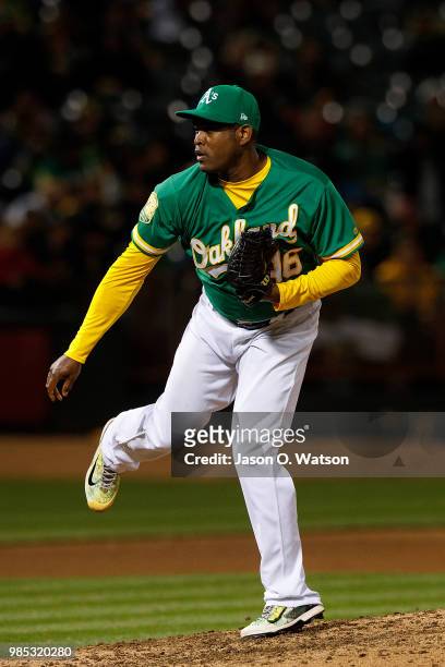 Santiago Casilla of the Oakland Athletics pitches against the Arizona Diamondbacks during the eighth inning at the Oakland Coliseum on May 25, 2018...