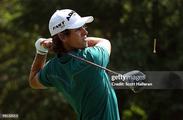 Aaron Baddeley of Australia watches his tee shot on the ninth hole during the final round of the Verizon Heritage at the Harbour Town Golf Links on...