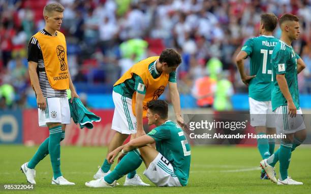 Sebastian Rudy of Germany consoles Mario Gomez of Germany who looks dejected following their sides defeat in the 2018 FIFA World Cup Russia group F...