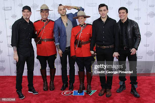 Hedley pose on CTV's Red Carpet at the 2010 Juno Awards at the Mile One Centre on April 18, 2010 in Saint John's, Canada.