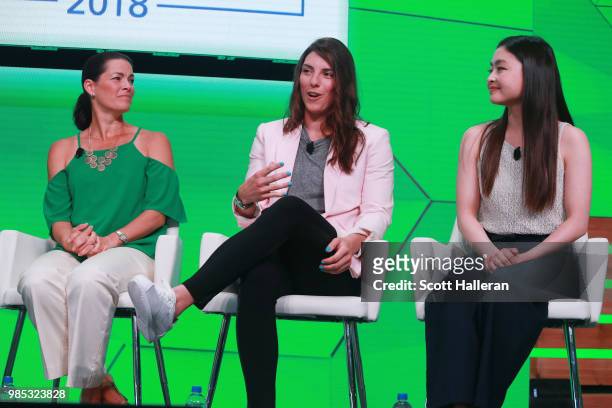 Olympians Nancy Kerrigan, Hilary Knight and Maria Shibutani speak on stage during the KPMG Women's Leadership Summit prior to the start of the KPMG...