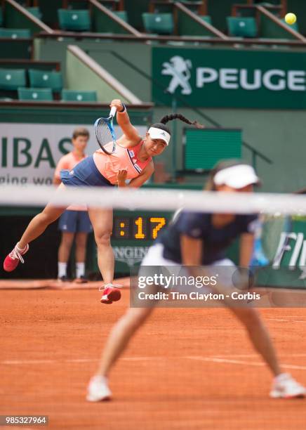 June 10. French Open Tennis Tournament - Day Fifteen. Eri Hozumi of Japan in action with her doubles partner Makoto Ninomiya of Japan against Barbora...