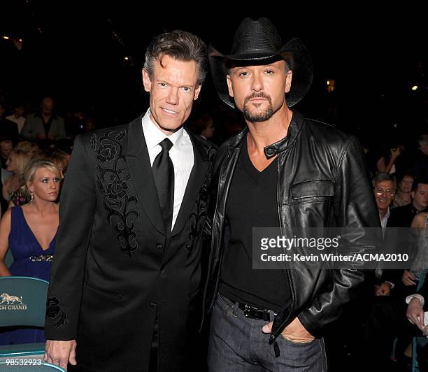 Musicians Randy Travis and Tim McGraw pose in the audience during the 45th Annual Academy of Country Music Awards at the MGM Grand Garden Arena on...