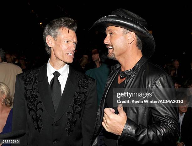 Musicians Randy Travis and Tim McGraw pose in the audience during the 45th Annual Academy of Country Music Awards at the MGM Grand Garden Arena on...