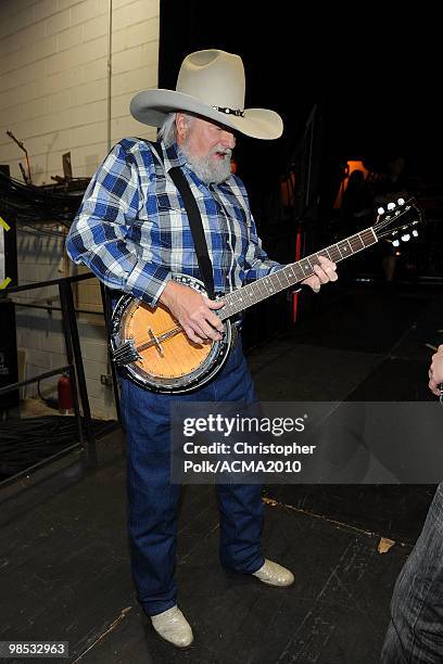 Musician Charlie Daniels plays backstage at the 45th Annual Academy of Country Music Awards at the MGM Grand Garden Arena on April 18, 2010 in Las...