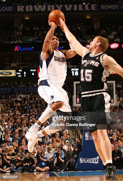 Shawn Marion of the Dallas Mavericks shoots the runner against Matt Bonner of the San Antonio Spurs in Game One of the Western Conference...