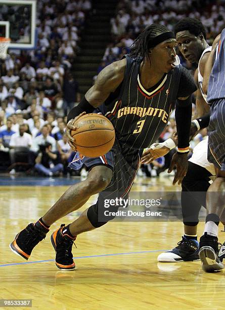 Gerald Wallace of the Charlotte Bobcats drives around Mickael Pietrus of the Orlando Magic in Game One of the Eastern Conference Quarterfinals during...