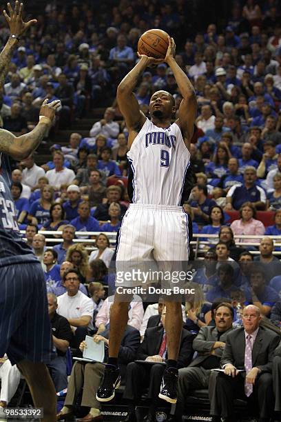 Rashard Lewis of the Orlando Magic shoots Boris Diaw of the Charlotte Bobcats in Game One of the Eastern Conference Quarterfinals during the 2010 NBA...