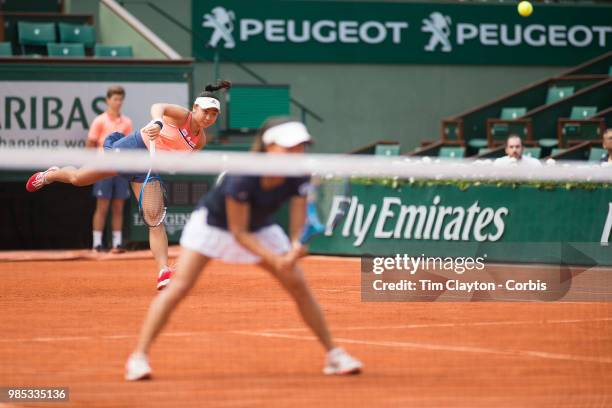 June 10. French Open Tennis Tournament - Day Fifteen. Eri Hozumi of Japan in action with her doubles partner Makoto Ninomiya of Japan against Barbora...