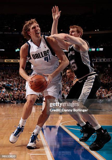 Dirk Nowitzki of the Dallas Mavericks posts up against Matt Bonner of the San Antonio Spurs in Game One of the Western Conference Quarterfinals...