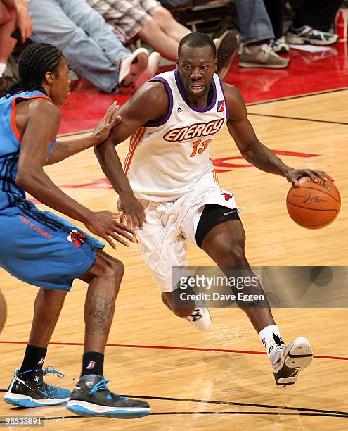 Denham Brown of the Iowa Energy drives against Larry Owens of the Tulsa 66ers in the second half of Game Two of their semi-final round series in the...