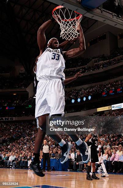 Brendan Haywood of the Dallas Mavericks goes up for a dunk against DeJuan Blair of the San Antonio Spurs in Game One of the Western Conference...