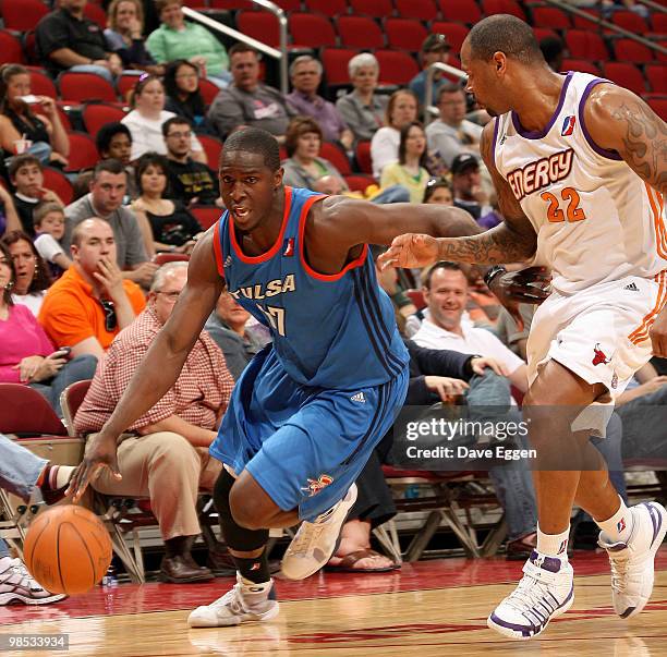 Moses Ehambe of the Tulsa 66ers dries against Jeff Trepagnier of the Iowa Energy in the first half of Game Two of their semi-final round series in...