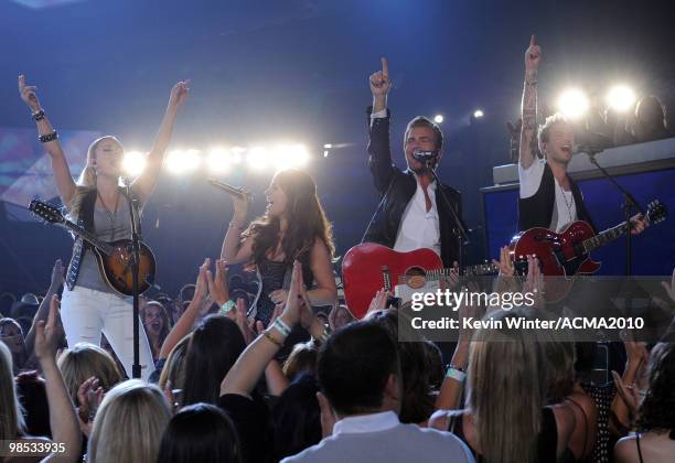 Singers Cheyenne Kimball, Rachel Reinert, Tom Gossin and Mike Gossin of the band Gloriana perform onstage during the 45th Annual Academy of Country...