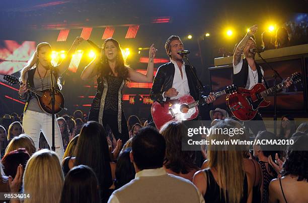 Singers Cheyenne Kimball, Rachel Reinert, Tom Gossin and Mike Gossin of the band Gloriana perform onstage during the 45th Annual Academy of Country...