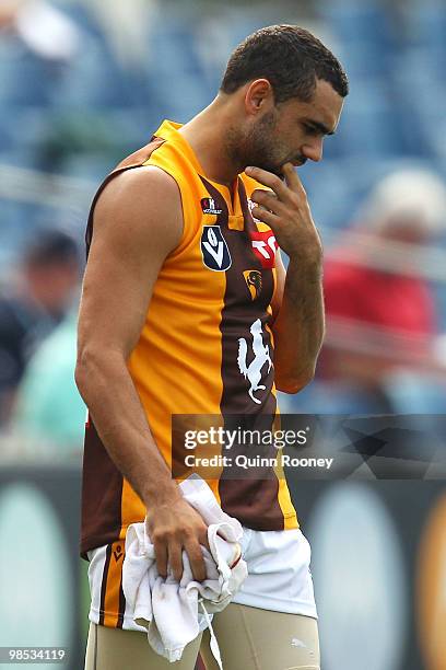 Shaun Burgoyne of Box Hill holds his jaw during the round two VFL match between Geelong and Box Hill at Skilled Stadium on April 18, 2010 in...