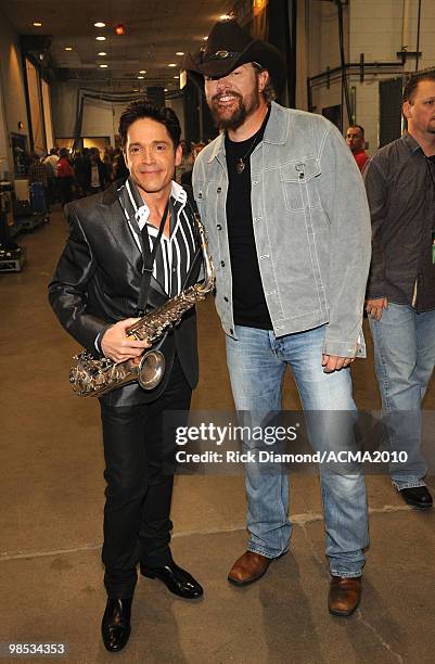 Musicians Dave Koz and Toby Keith backstage at the 45th Annual Academy of Country Music Awards at the MGM Grand Garden Arena on April 18, 2010 in Las...