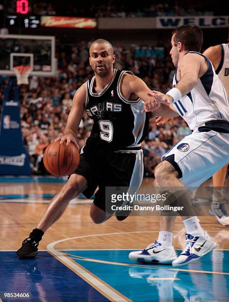 Tony Parker of the San Antonio Spurs drives against Jose Juan Barea of the Dallas Mavericks in Game One of the Western Conference Quarterfinals...