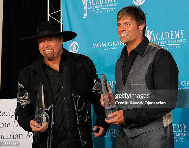 Singers Eddie Montgomery and Troy Gentry of Montgomery Gentry, recipients of the Home Depot Humanitarian Award pose in the press room during the 45th...