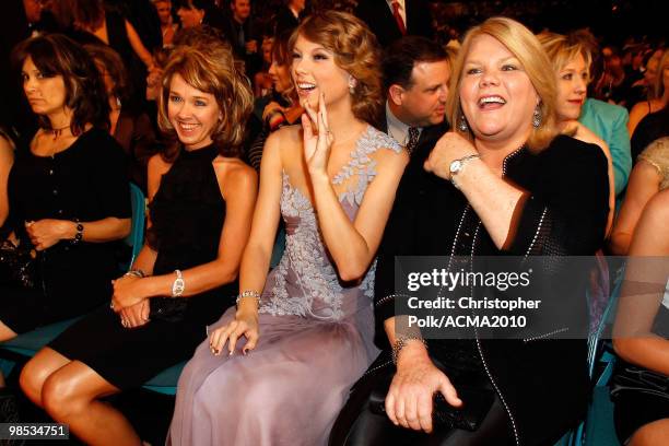 Taylor Swift and Andrea Swift watch from the audience at the 45th Annual Academy of Country Music Awards at the MGM Grand Garden Arena on April 18,...