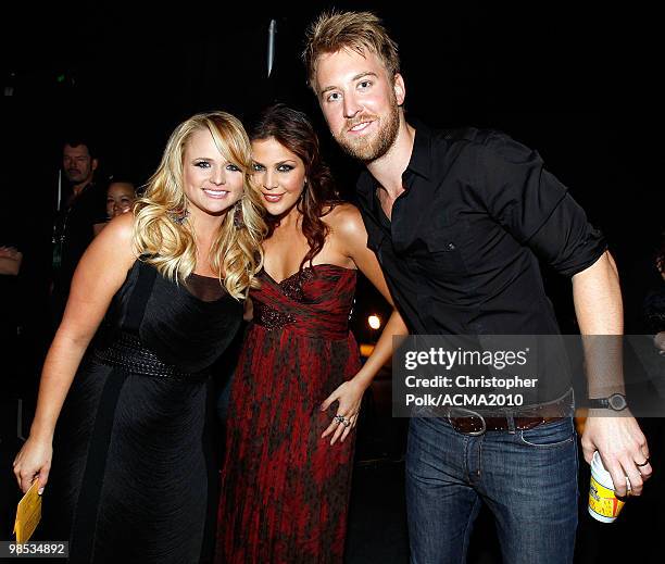 Miranda Lambert, Hillary Scott and Charles Kelley of the band Lady Antebellum pose backstage at the 45th Annual Academy of Country Music Awards at...