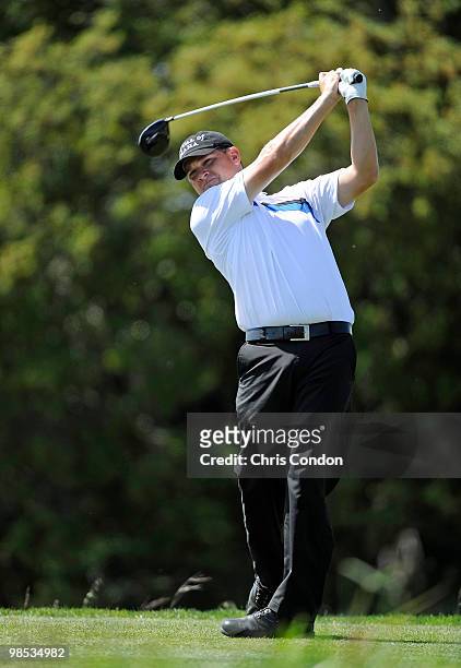 Jon Mills of Canada tees off on during the final round of the Fresh Express Classic at TPC Stonebrae on April 18, 2010 in Hayward, California.