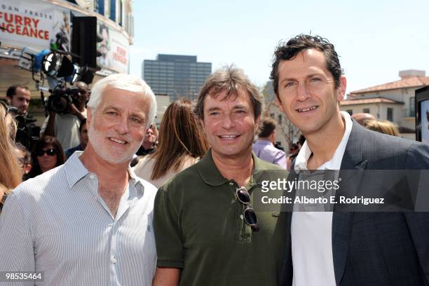 Summit's Rob Friedman, Summit's Patrick Wachsberger and Summit's Erik Feig arrive at the premiere of Summit Entertainment and Participant Media's...