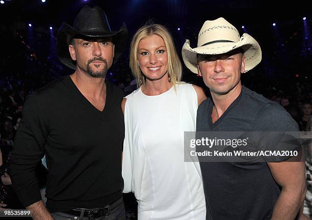 Musicians Tim McGraw, Faith Hill, and Kenny Chesney pose in the audience during the 45th Annual Academy of Country Music Awards at the MGM Grand...