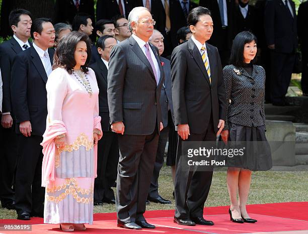 Malaysian Prime Minister Najib Tun Razak and his wife, Datin Sri Rosmah Mansor listens to the national anthems with Japanese Prime Minister Yukio...