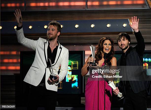 Musicians Charles Kelley, Hillary Scott, and Dave Haywood of the band Lady Antebellum accept the Song Of The Year award during the 45th Annual...