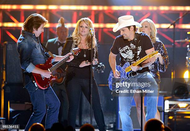 Recording artist John Fogerty, singer Miranda Lambert, recording artist Brad Paisley, and singer Carrie Underwood perform onstage during the 45th...