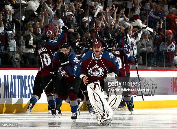 Backup goaltender Peter Budaj of the Colorado Avalanche skates onto the ice to celebrate the team's 1-0 overtime win against the San Jose Sharks in...