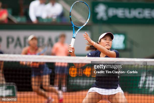 June 10. French Open Tennis Tournament - Day Fifteen. Makoto Ninomiya of Japan in action with her doubles partner Eri Hozumi of Japan against Barbora...