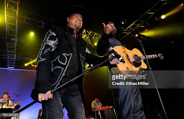 Singers Eddie Montgomery and Troy Gentry of Montgomery Gentry perform onstage at the 45th Annual Academy of Country Music Awards All Star Jam at the...