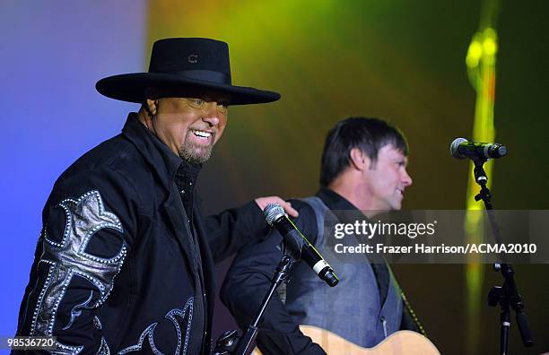 Singers Eddie Montgomery and Troy Gentry of Montgomery Gentry perform onstage at the 45th Annual Academy of Country Music Awards All Star Jam at the...