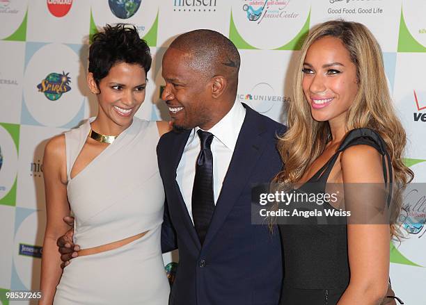 Actors Halle Berry, Jamie Foxx and singer Leona Lewis arrive to Jenesse Center's 30th Anniversary Silver Rose Weekend at the Beverly Hills Hotel on...