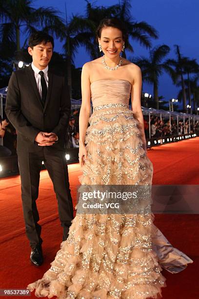 Taiwanese actress Shu Qi and actor Chang Chen pose on the red carpet of the 29th Hong Kong Film Awards at the Hong Kong Cultural Centre on April 18,...